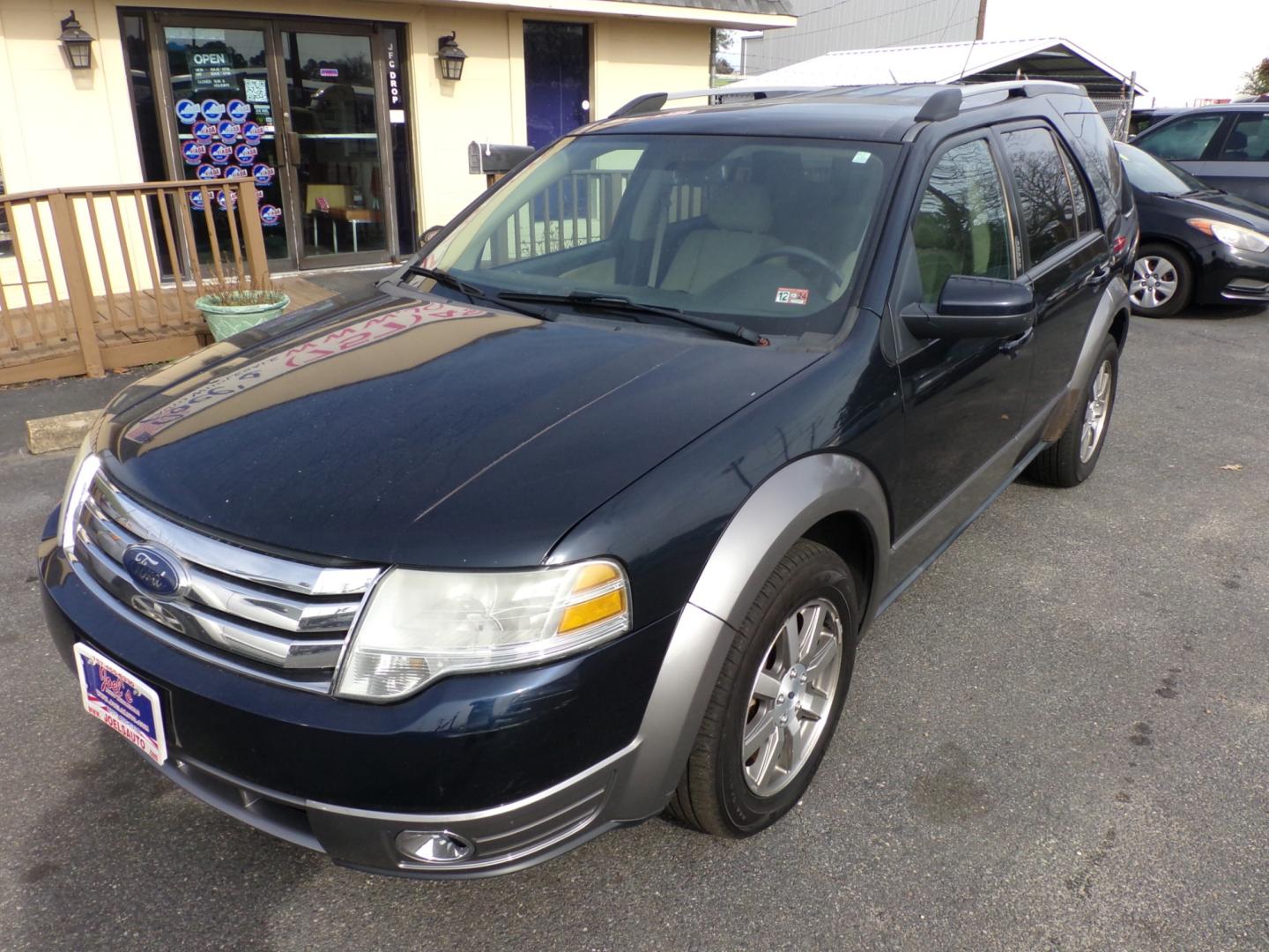 2008 Blue Ford Taurus X SEL FWD (1FMDK02W18G) with an 3.5L V6 DOHC 24V engine, 6-Speed Automatic Overdrive transmission, located at 5700 Curlew Drive, Norfolk, VA, 23502, (757) 455-6330, 36.841885, -76.209412 - Photo#3